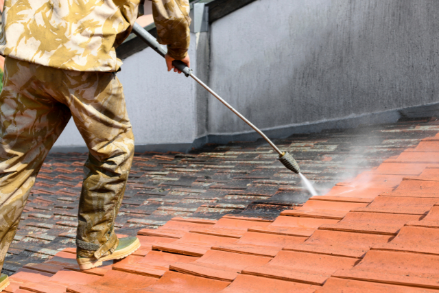 High pressure washing of rooftop