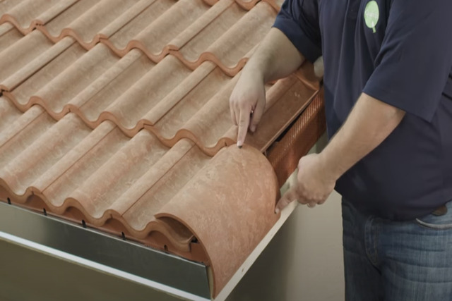 Miramar Roofing worker installing clay tiles